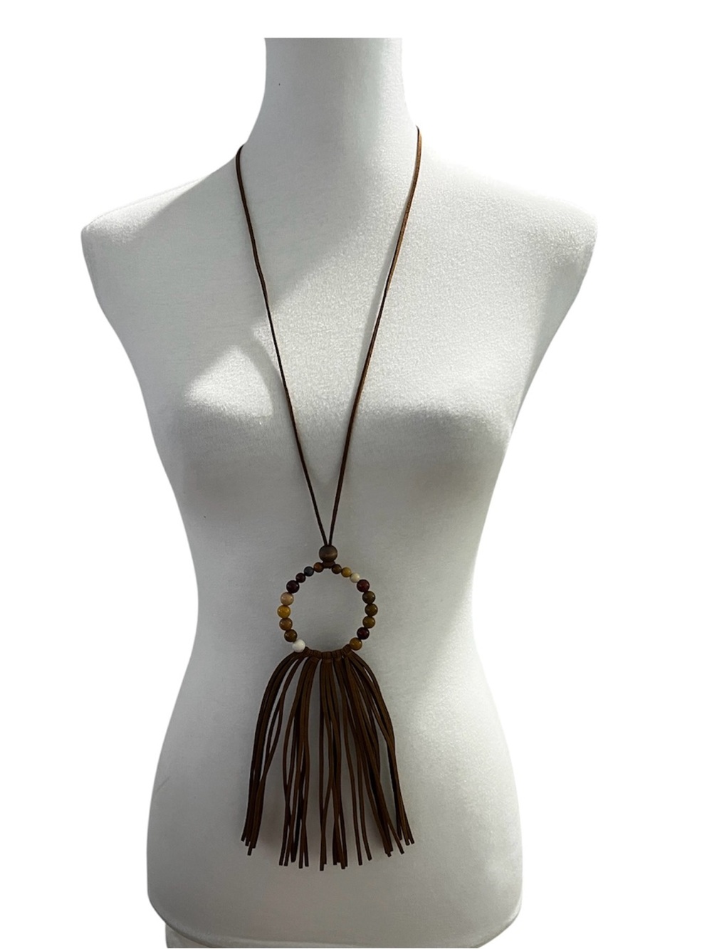 Paparazzi Tassel statement necklace and earrings 
Tasseled faux leather long